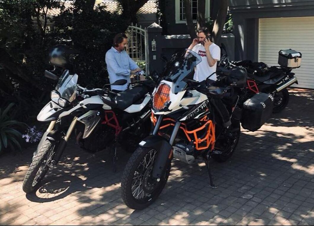 Image of Jean Cooper and De Witt Oosthuizen with their motorbikes